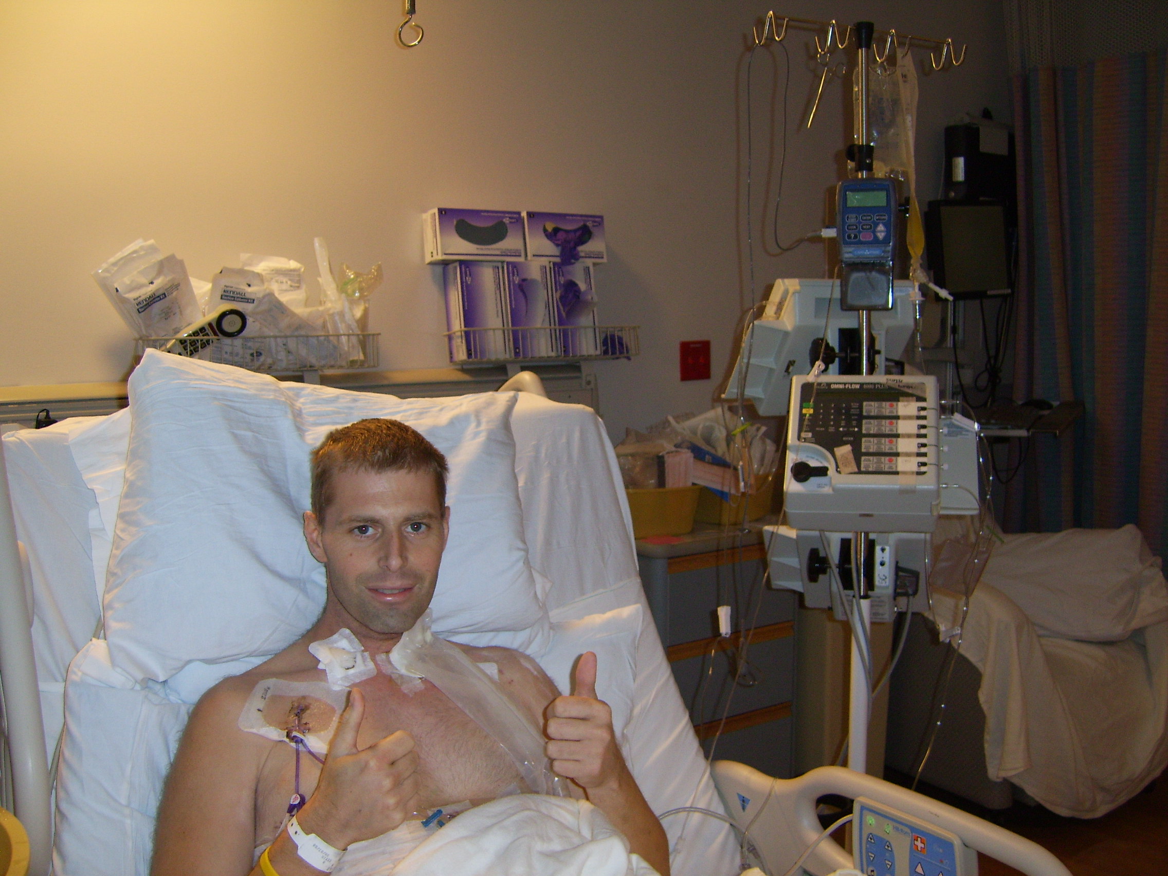 It's hard to see, but Kev is giving a thumbs up to only 3 things being hung from his IV: saline, electrolytes and pain meds-Slowly gettin better!